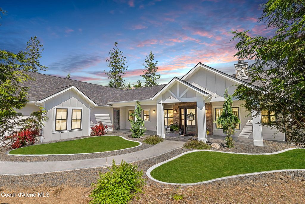 Photo of 7353 Riverview Dr, Coeur dAlene, ID 83814 (MLS # 25-9654)