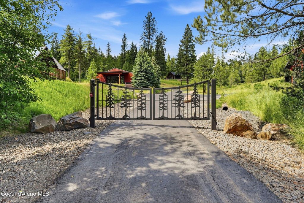 Photo of 10439 Cougar Gulch Rd, Coeur dAlene, ID 83814 (MLS # 26-6561)