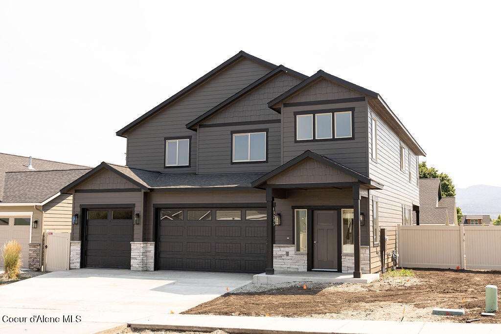 Photo of 13236 Tali Ave, Post Falls, ID 83854 (MLS # 26-6818)