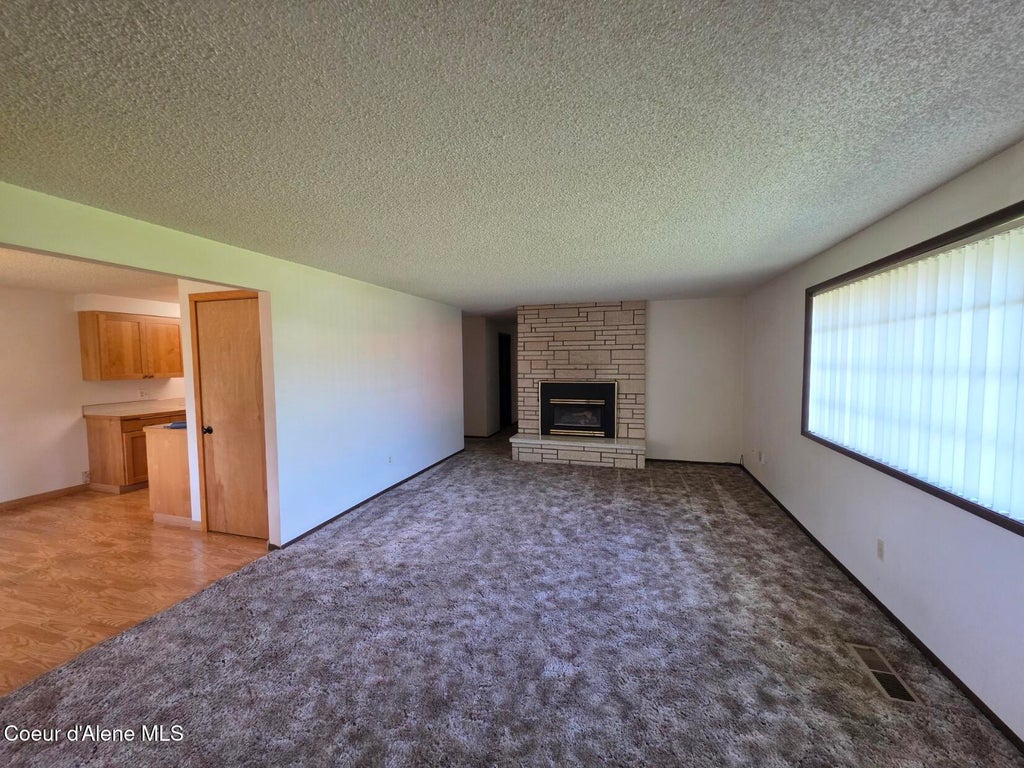 Photo of 2341 HONEYSUCKLE DR, Coeur dAlene, ID 83814 (MLS # 26-9608)