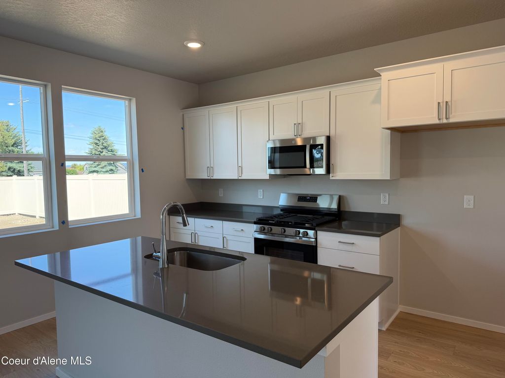 Photo of 4909 Homeward Bound Blvd, Post Falls, ID 83854 (MLS # 26-4777)