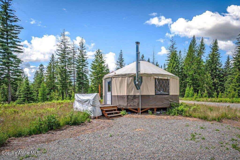 Photo of 317 Treetop Bluff Bluff, Bonners Ferry, ID 83805 (MLS # 26-5970)