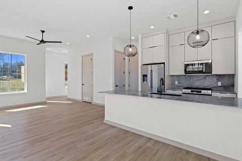 Photo of 1736 Bunche RD #Building 6, Austin, TX 78721 (MLS # 7710704)