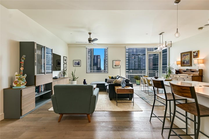Spacious, open-concept layout is filled with natural light