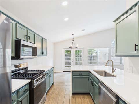 Photo of 7400 Crepe Myrtle DR, Austin, TX 78744 (MLS # 8700512)