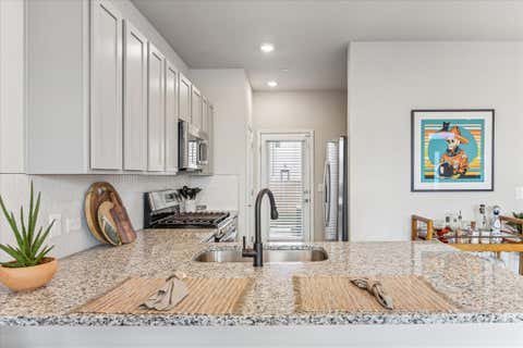Tiny photo for 9015 Cattle Baron PATH #1002, Austin, TX 78747 (MLS # 9561977)