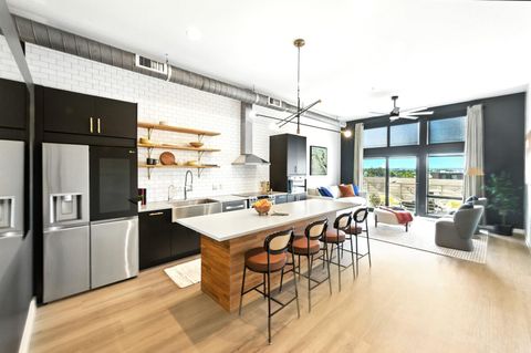 Photo of 2124 E 6th ST #418, Austin, TX 78702 (MLS # 9628879)