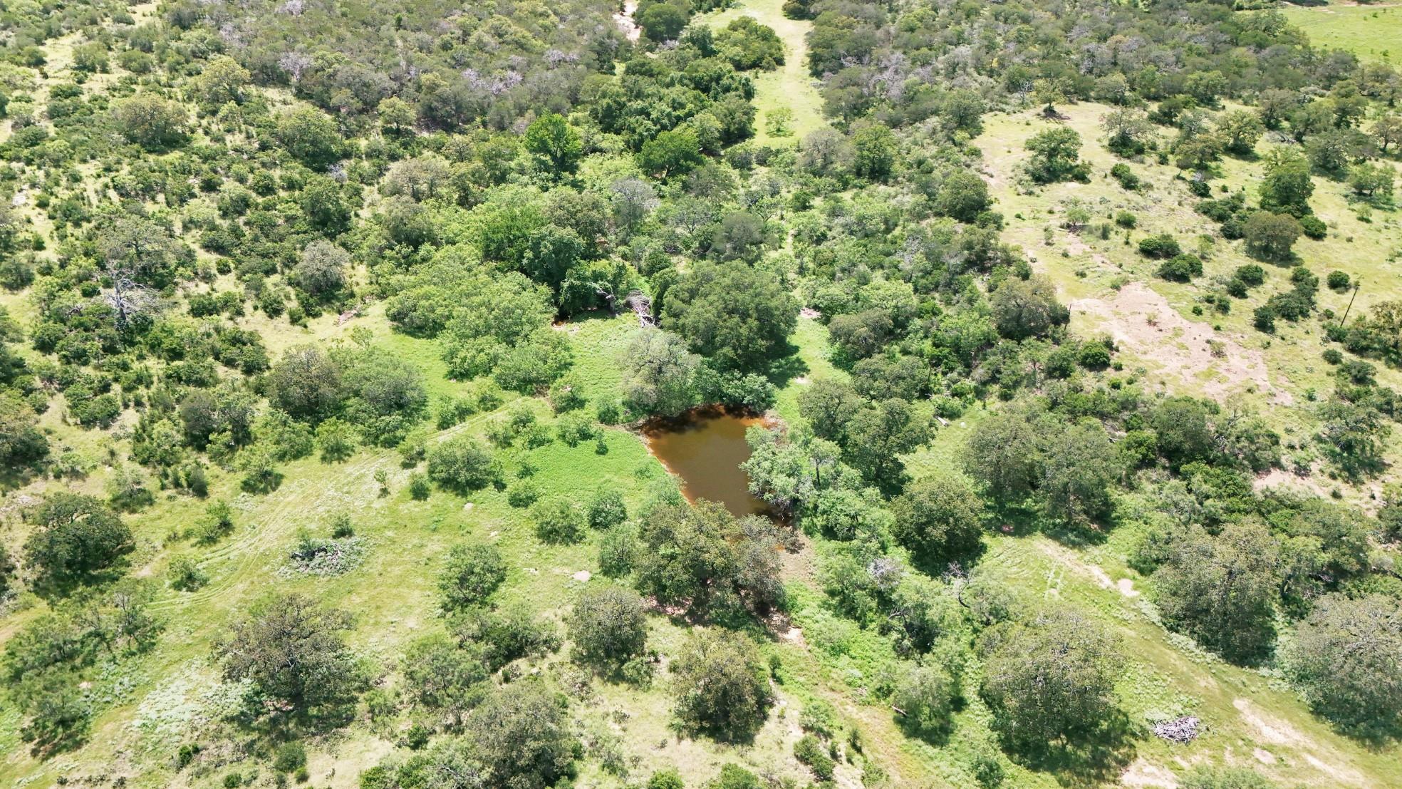 Overview of rural landscape featuring a large bod