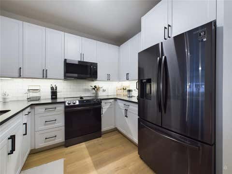 Tiny photo for 54 Rainey ST #415, Austin, TX 78701 (MLS # 1844029)