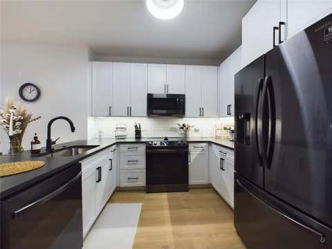 Tiny photo for 54 Rainey ST #415, Austin, TX 78701 (MLS # 1844029)