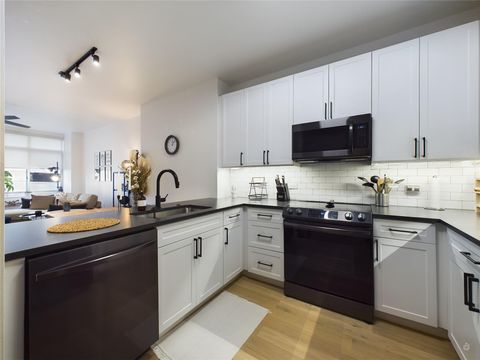 Tiny photo for 54 Rainey ST #415, Austin, TX 78701 (MLS # 1844029)