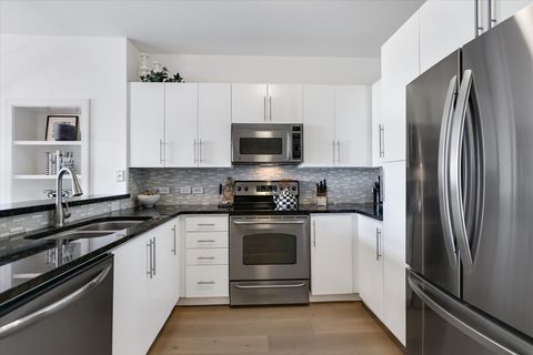 Tiny photo for 54 Rainey ST #617, Austin, TX 78701 (MLS # 5555368)