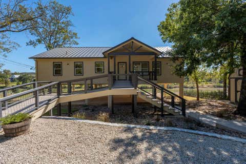 Photo of 1830 Flite Acres RD, Wimberley, TX 78676 (MLS # 7205128)
