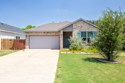 Photo of 303 W Browning ST, Manor, TX 78653 (MLS # 5177593)