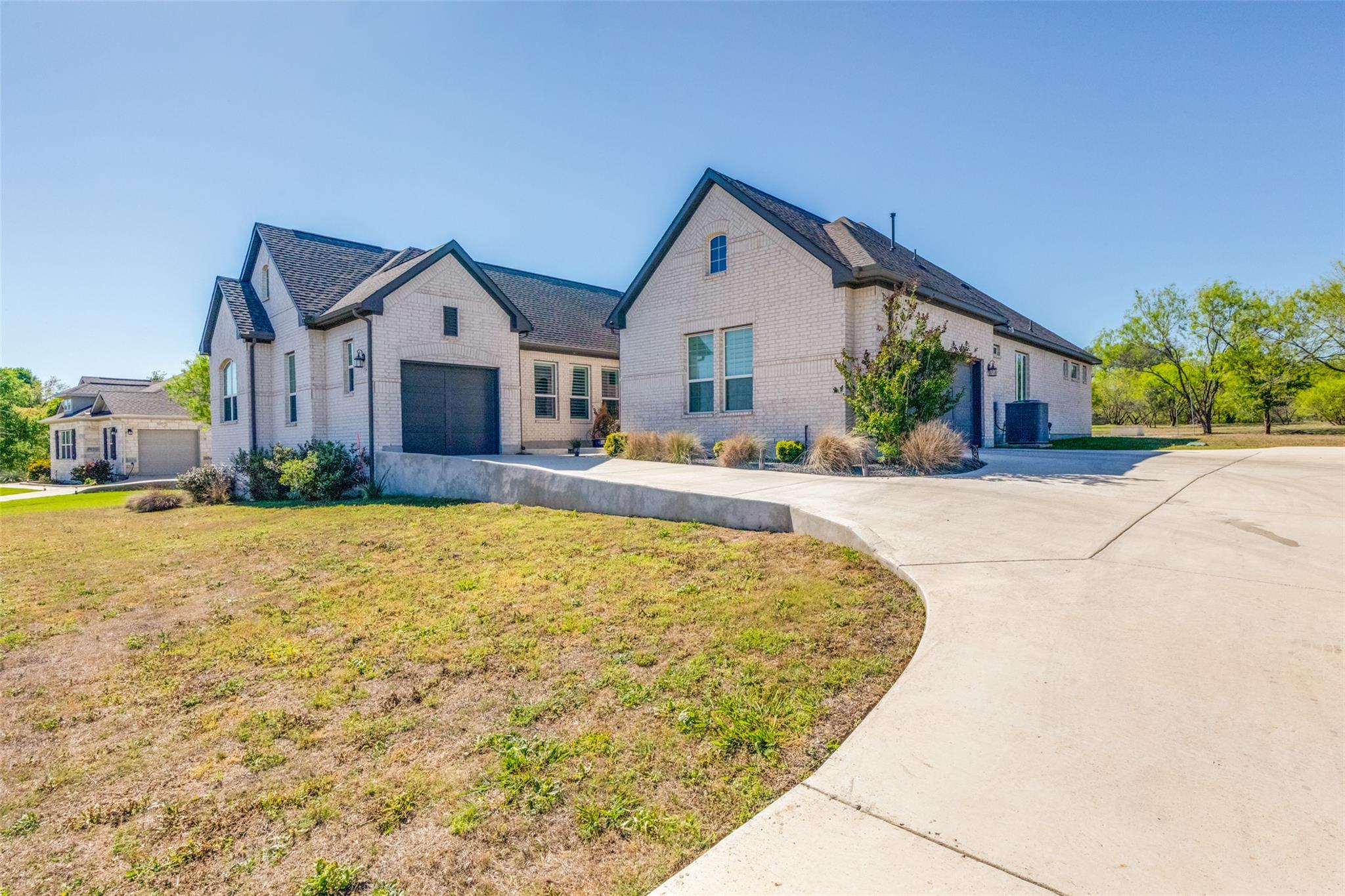 White brick exterior with dark trim