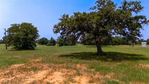 Photo of 000 Cattlemens Row RD, Lockhart, TX 78644 (MLS # 7743773)