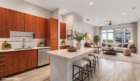 Photo of 54 Rainey ST #PH09, Austin, TX 78701 (MLS # 6227613)