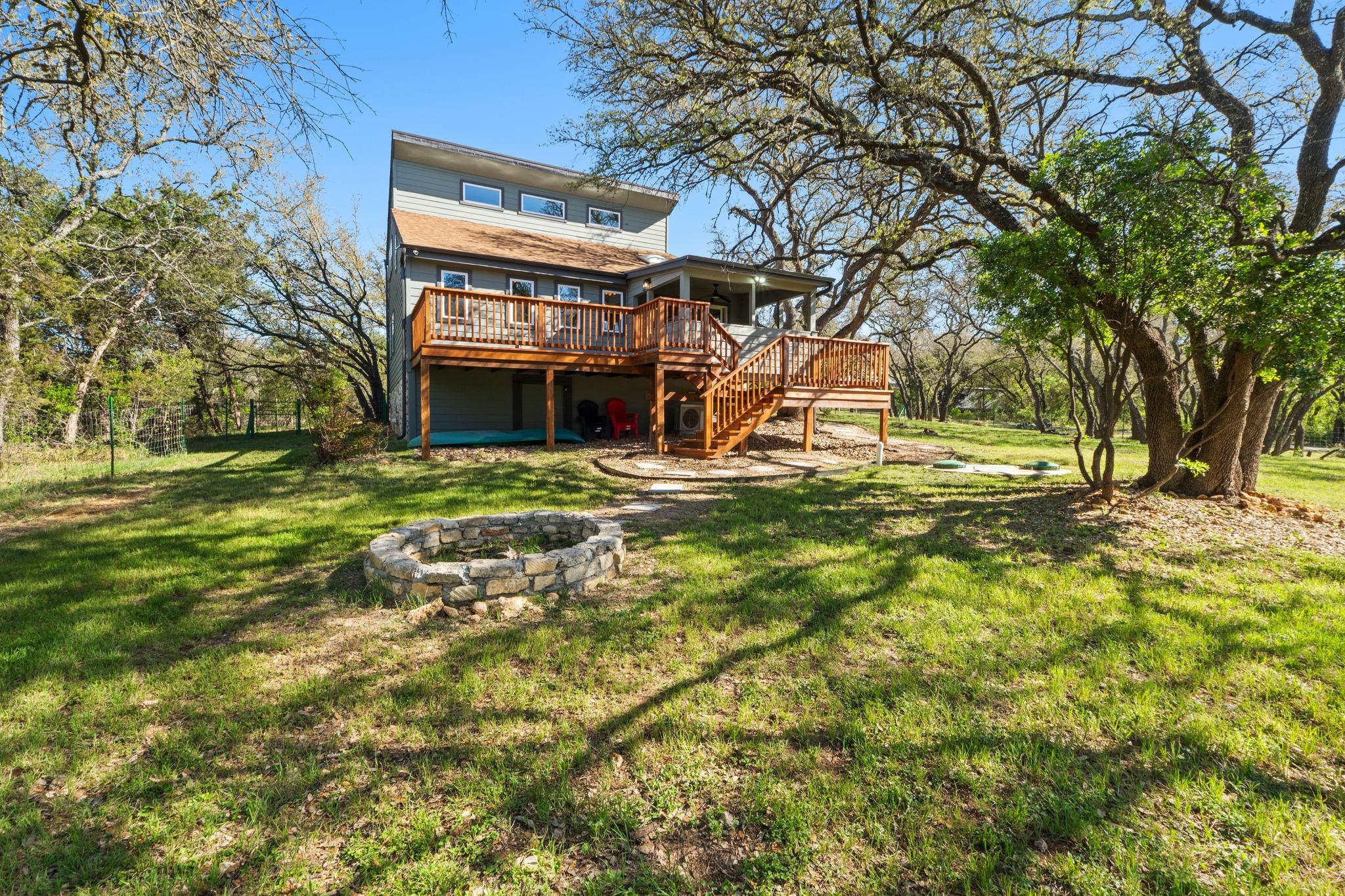 View from above of property with a forest