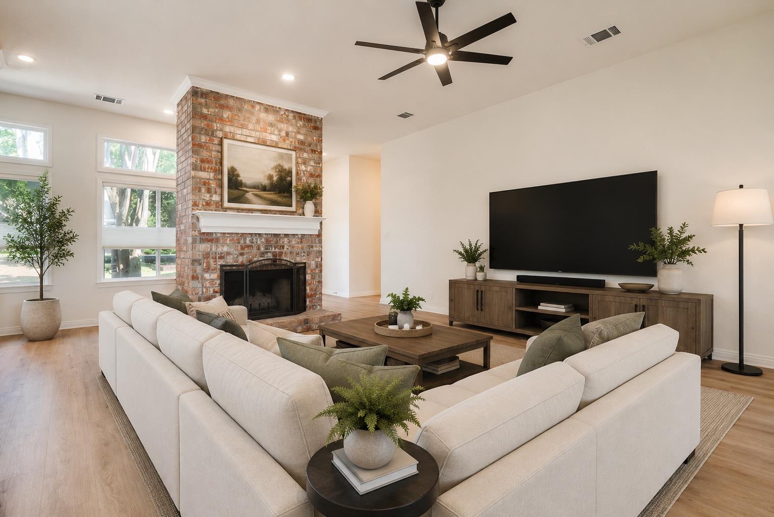 Brick facade home featuring a prominent entryway