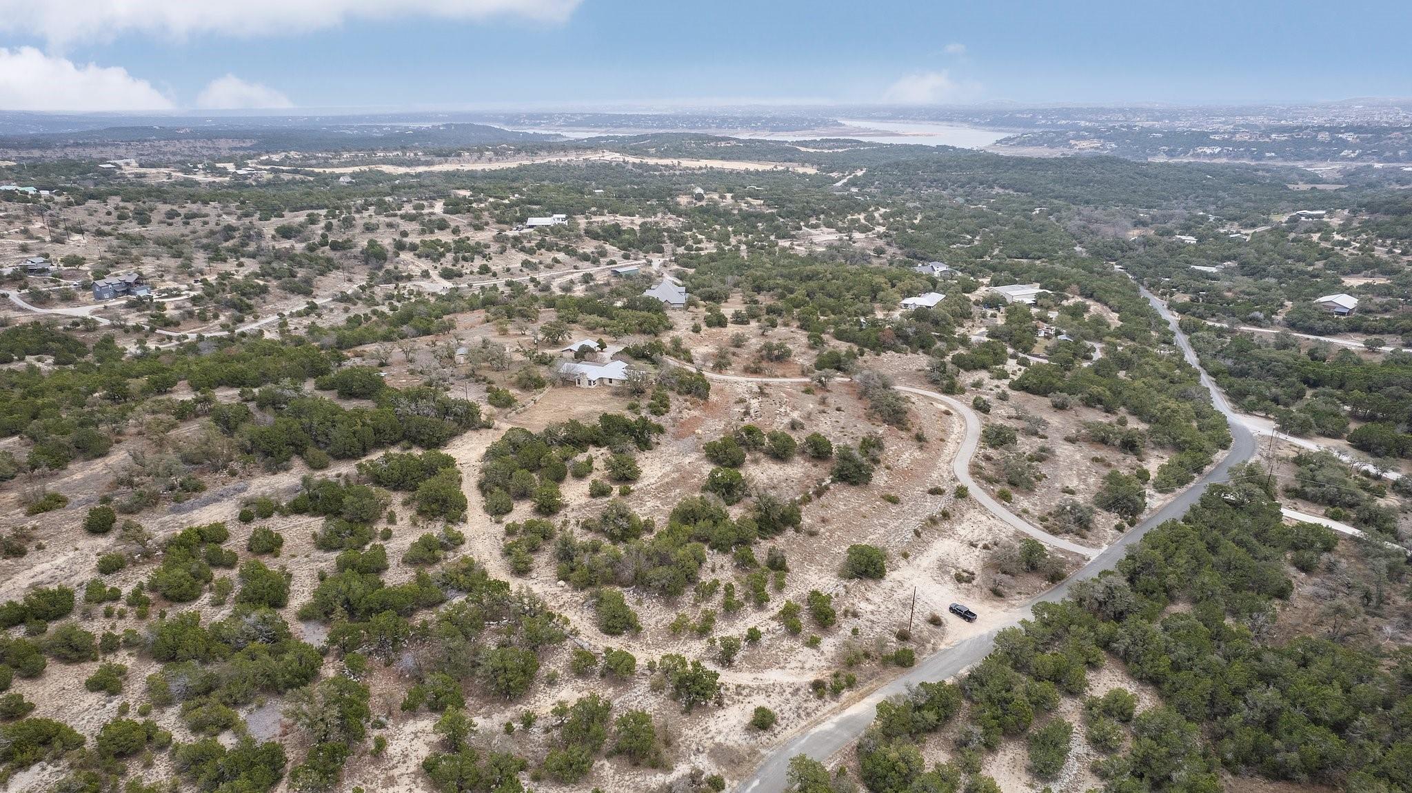 Exceptional opportunity to secure 14-ACRES of prime HILL COUNTRY land in scenic SPICEWOOD, Texas.