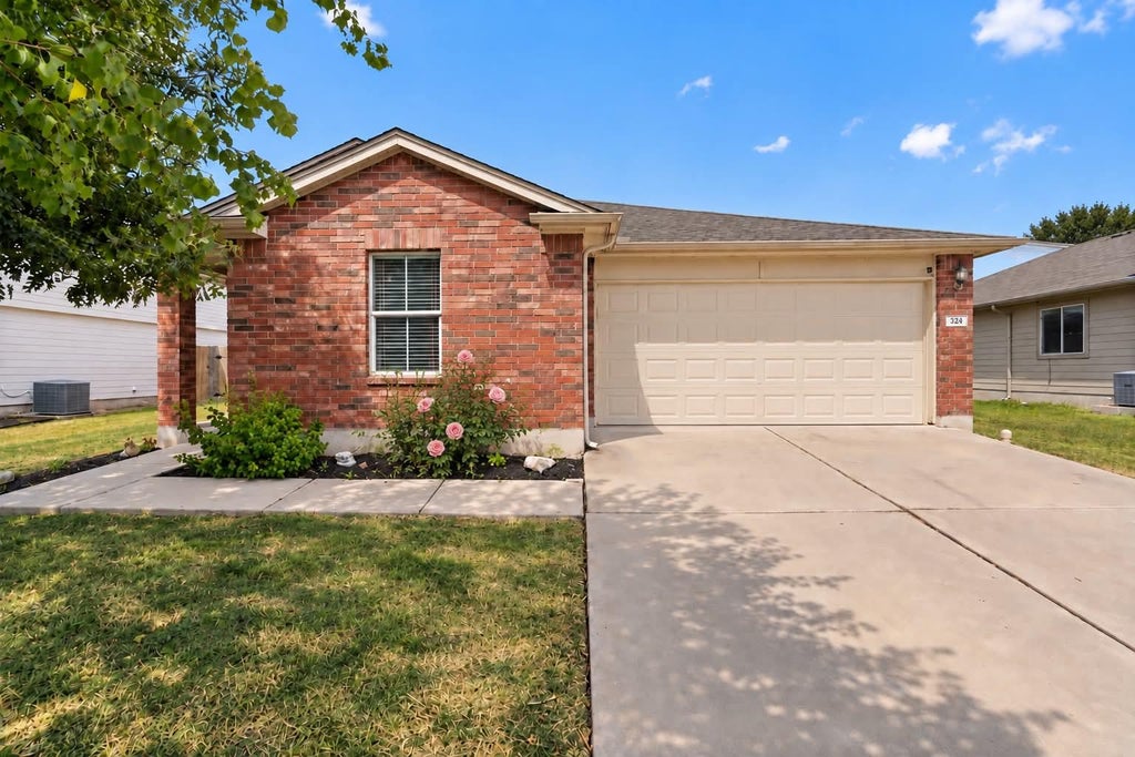Photo of 324 Almquist ST, Hutto, TX 78634 (MLS # 2165851)