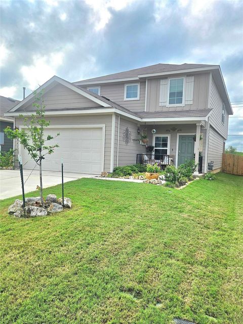 Photo of 12419 Silversmith LN, Mustang Ridge, TX 78610 (MLS # 3781731)