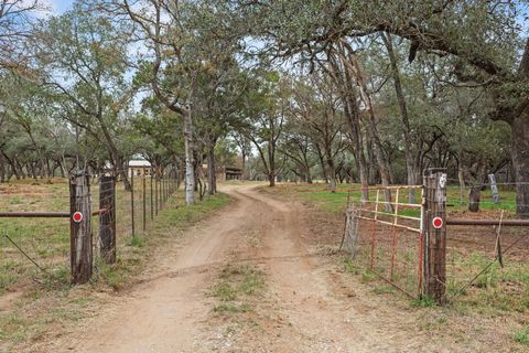 Photo of 122 Winding Creek RD, Spicewood, TX 78669 (MLS # 6055737)
