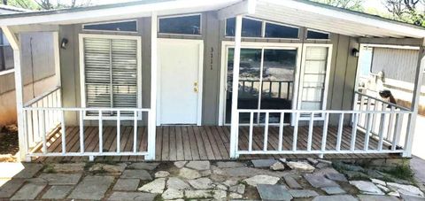 Photo of 3111 FRITZ HUGHES PARK RD, Austin, TX 78732 (MLS # 7068018)