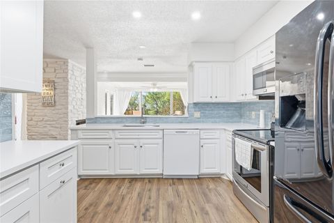 Photo of 113 World Of Tennis SQ, Lakeway, TX 78738 (MLS # 1919404)