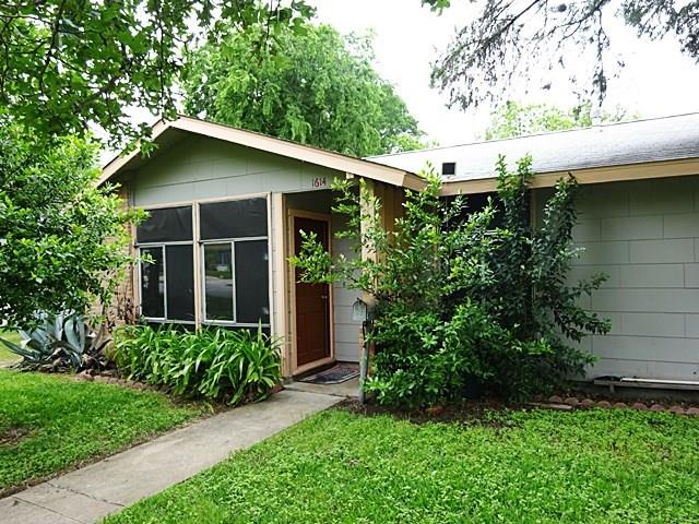 1614 Cloverleaf has 3 bedrooms and 1 bath. It is distinguished by its many floor-to-ceiling windows and large corner lot.