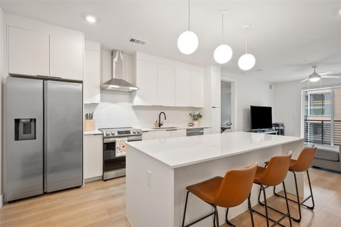Photo of 1701 Simond Ave #305, Austin, TX 78723 (MLS # 9903351)