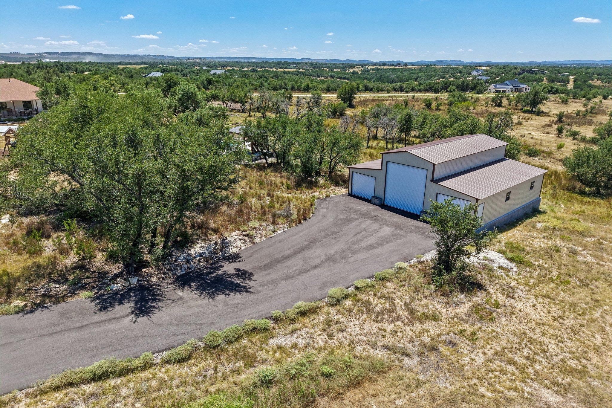 100 W Leaning Madrone DR