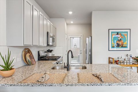 Tiny photo for 9015 Cattle Baron PATH #1002, Austin, TX 78747 (MLS # 4188686)