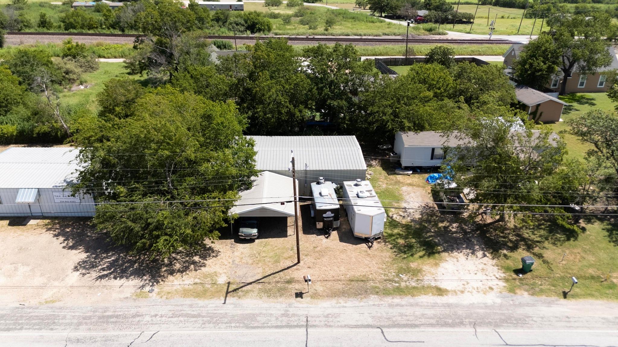 Photo 1 of 27 — 508 W Mesquite Ave, Rogers, TX 76569