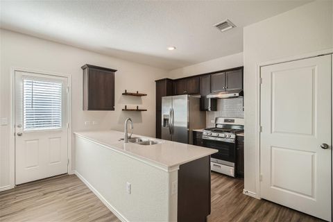 Photo of 7101 Spirit Hill RD, Austin, TX 78744 (MLS # 2998657)