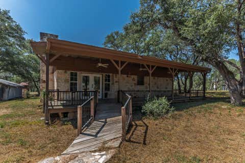 Photo of 122 Winding Creek RD, Spicewood, TX 78669 (MLS # 5365251)