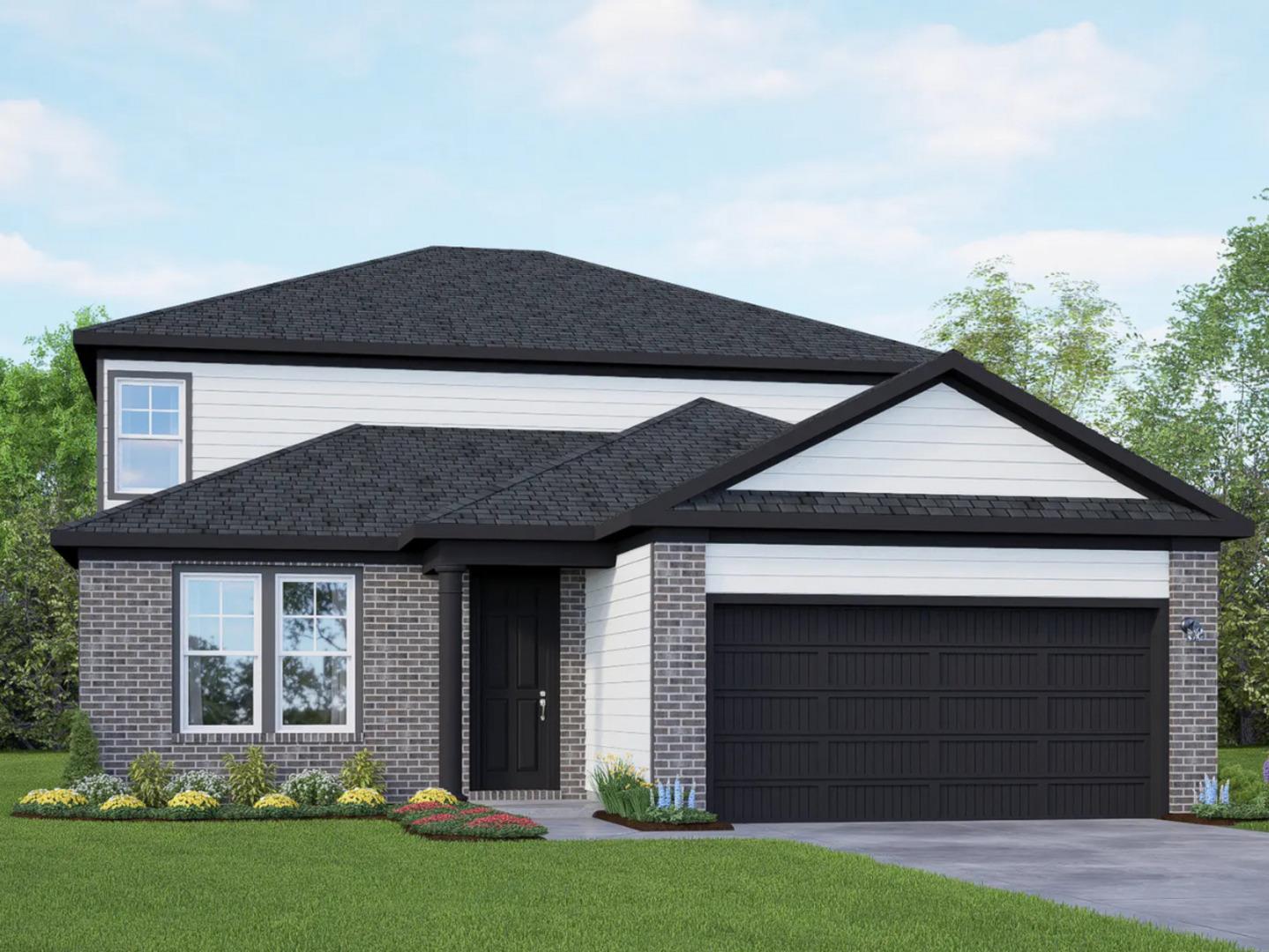 View of front of house featuring brick siding, a
