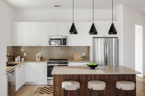 Tiny photo for 800 Embassy DR #408, Austin, TX 78702 (MLS # 2781391)