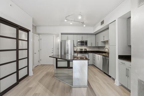 Tiny photo for 54 Rainey ST #509, Austin, TX 78701 (MLS # 3436351)