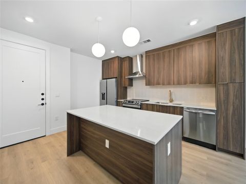 Photo of 1701 Simond Ave #302, Austin, TX 78723 (MLS # 3595412)