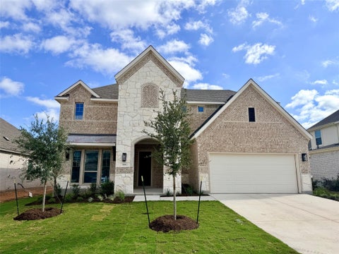 Photo of 908 SUNNY RIDGE DR, Leander, TX 78641 (MLS # 4093977)