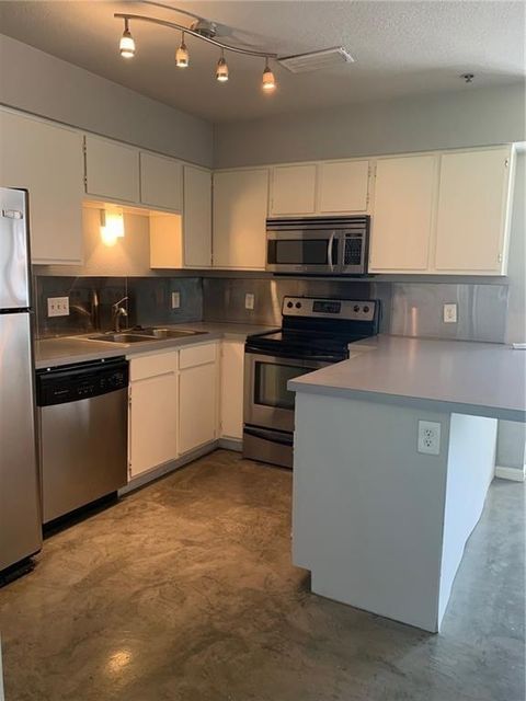 Photo of 1013 W 23rd ST #202, Austin, TX 78705 (MLS # 1148386)