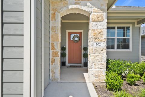 Photo of 202 Barton Creek LN, Hutto, TX 78634 (MLS # 1736316)