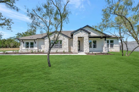 Photo of 104 Rees Landing RD, Spicewood, TX 78669 (MLS # 2067408)