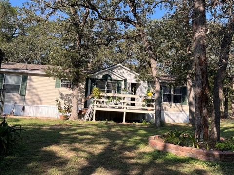 Photo of 242 Shadow Oak DR, Bastrop, TX 78602 (MLS # 6656180)