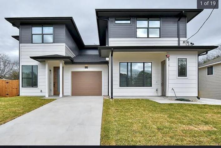 View of front of house with concrete driveway