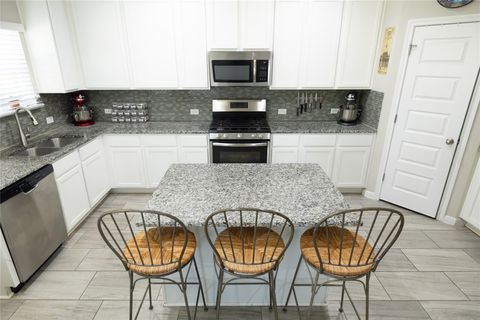 Photo of 827 Savannah CV, Elgin, TX 78621 (MLS # 9588296)