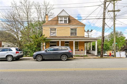 Photo of 310 Harrison Ave, Jeannette, PA 15644 (MLS # 1750621)