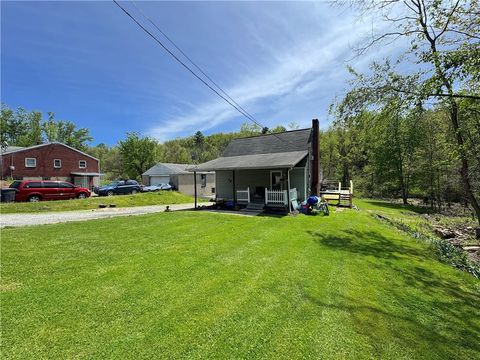 Photo of 148 Poverty Hollow Rd, Darragh, PA 15625 (MLS # 1751773)