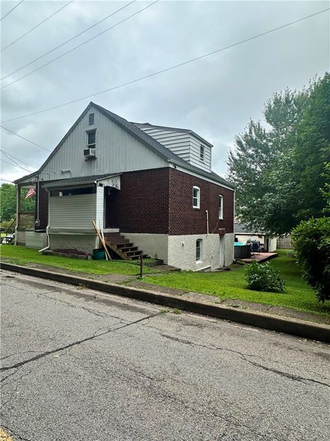 Photo of 1030 Scott Ave, Jeannette, PA 15644 (MLS # 1762304)